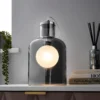 Jinx Table Lamp - Smoked Glass -Homebase Sales Store 13208310 1614896913089462