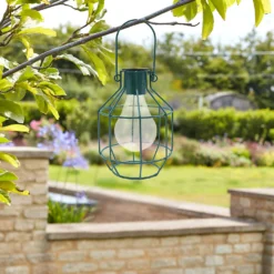 House Beautiful Firefly Solar Powered Caged Lantern -Homebase Sales Store 13280804 1194933437034953
